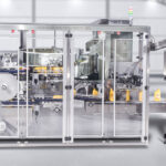 Compact Unscrambler with integrated bottle orienter