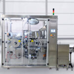 Compact Unscrambler with Integrated Inspection System