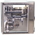 Compact Unscrambler | due to an integrated hopper elevator resulting in two machines in the space of one.