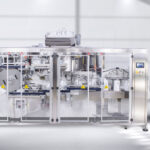 Heavy Duty Unscrambler with integrated Bottle Orienter