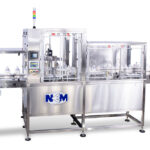 Rotary Bottle Orienter | High speed rotary orienter is the most versatile of NEM’s line of secondary orienters.