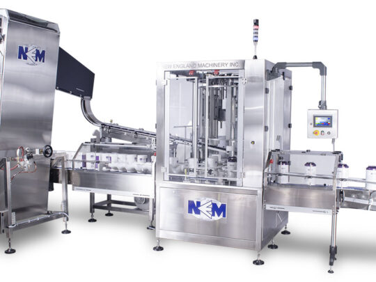 Rotary Plugger | Continuous motion rotary plugging machine that precisely aligns and places plugs or fitments into containers.