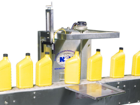 Inspection Rejection System | Inspects for skewed caps, missing caps or foil liners. It can detect down bottles or mis-oriented bottles